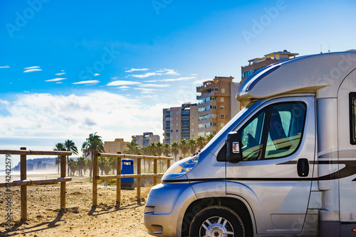 Rv motor home camping on beach in Spain
