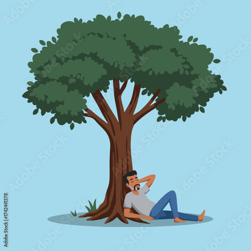 Person relaxing under a large tree on a clear day