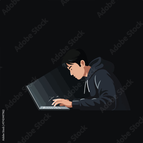Young person in hooded sweatshirt working on laptop in dim lighting