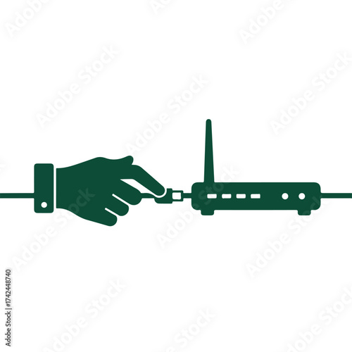 Hand connecting a cable to a wireless router