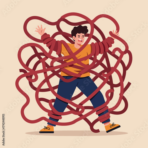 Young man entangled in tangled red ropes, looking distressed