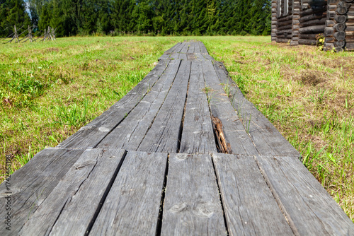 Old Wooden Plank Walkway in Village, Close-Up