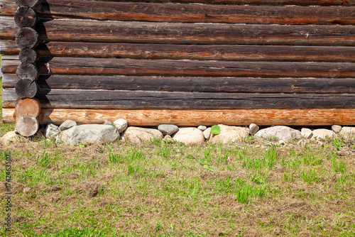 Log House on Rubble Stone Foundation Close-Up