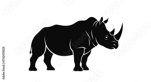 Majestic Black Rhinoceros Silhouette with Prominent Horns.