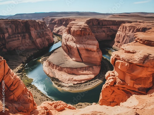 Stunning Horseshoe Bend landscape with vibrant colors and blue river winding through red rock canyon