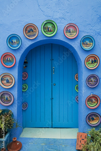 Beautiful blue painted streets and alleyways in the medina of Chefchaouen, Morocco. The concept of travel, exploration and wanderlust in one of the most iconic blue cities in the world.