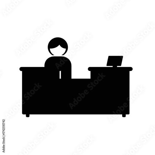 Woman behind hospital reception desk with computer for International Doctor's Day  