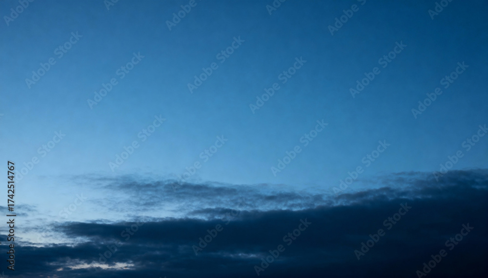 Fototapeta premium Abstract Cloudscape at Dusk With Dark Blue Sky Texture Background