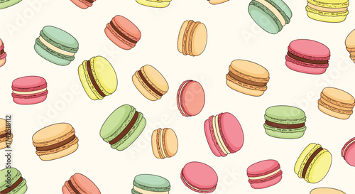 A colorful assortment of sweet french macarons scattered across a plain background.