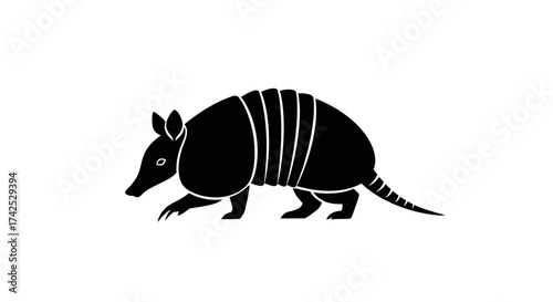 Silhouette of an Armadillo Walking - A Detailed Wildlife Illustration.