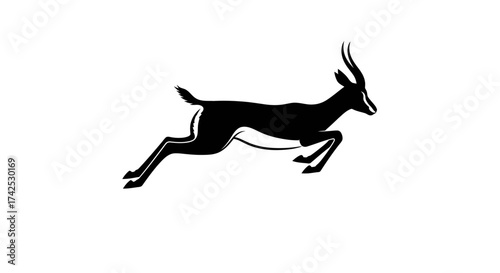 Dynamic black silhouette of a leaping impala antelope.
