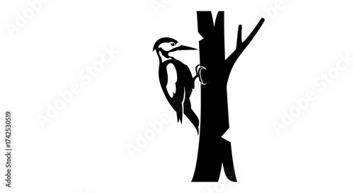 Woodpecker silhouette perched on tree trunk, pecking for food, black and white image.