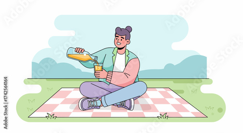 Enjoying Outdoor Relaxation With Juice At A Summer Picnic