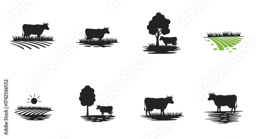 Black silhouettes of cows trees fields and sun in a rural landscape