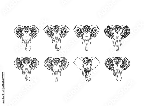 Set of Eight Ornate Elephant Heads with Mandala Designs.