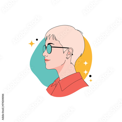 A stylish person with short blonde hair wearing glasses and a red shirt posing.
