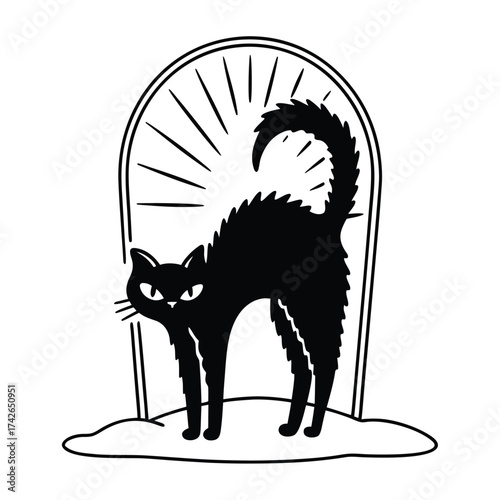 Black cat with arched back standing in front of tombstone