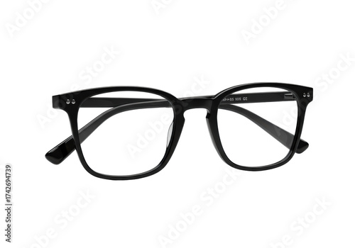 Extreme close-up macro of modern black eyeglasses with thick, glossy rectangular rims, isolated on transparent with soft shadow under dramatic studio light, concept of high-end design