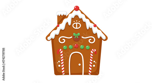 Festive gingerbread house with candy canes and icing for christmas