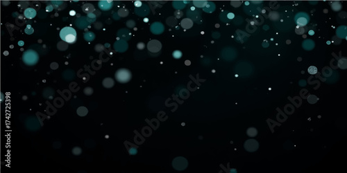 Bright, glowing blue water drops on glass texture create a winter holiday pattern with festive bokeh lights