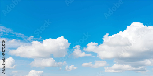 Bright, beautiful blue sky with fluffy white clouds on a clear summer day
