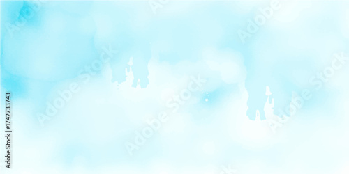 Bright summer sunlight illuminates a beautiful blue sky and white abstract clouds