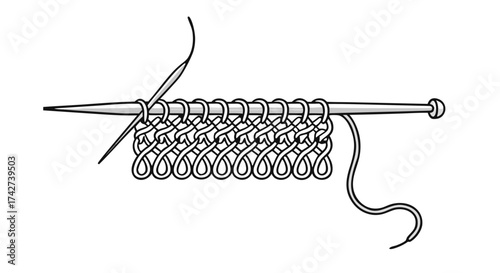 Knitting needles with yarn creating a detailed stitch pattern for textile design and crafting

