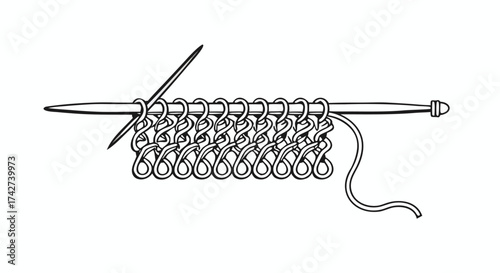 Knitting needles with yarn creating a detailed stitch pattern for textile design and crafting

