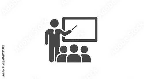 Teacher Presenting Information To A Group Of Students In A Classroom Setting