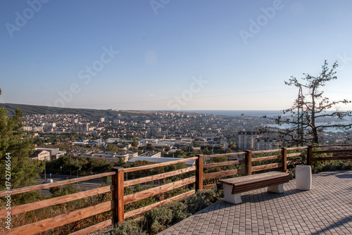A view from a mountainside on an autumn day. A view from the observation deck of the sea and the city of Gelendzhik. Autumn in the mountains by the Black Sea.