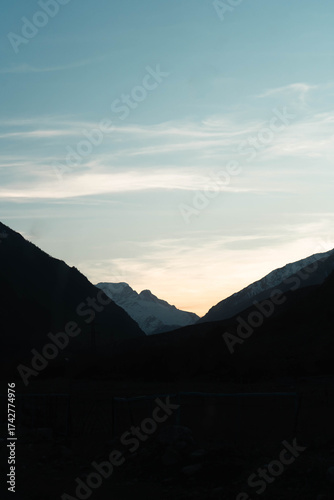 Panoramic mountain landscape visible from moving bus ride