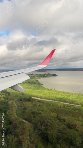 plane landing in Corrientes, Argentina, overlooking the Paraná River
