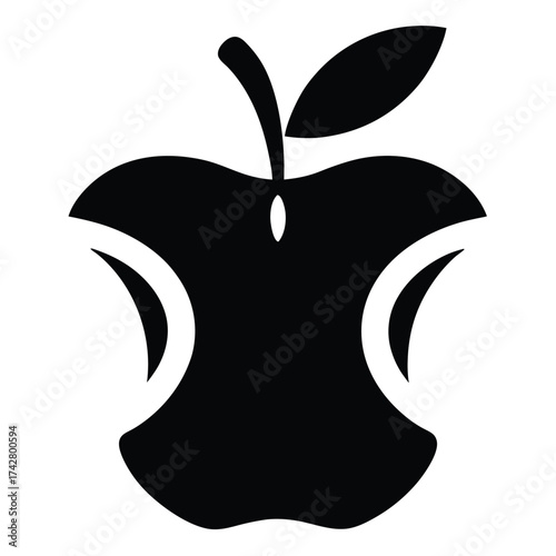 A black apple core shows what's left after someone has eaten the fruit