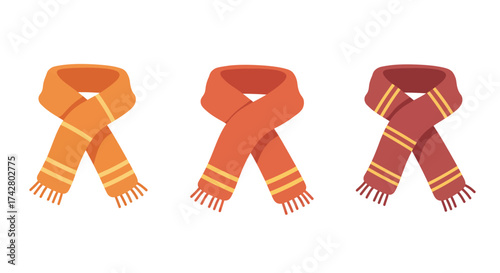 Three colorful knitted scarves with tassels displayed against a white background