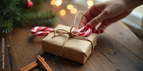 Rustic Christmas candy cane gift with natural twine and festive wrapping