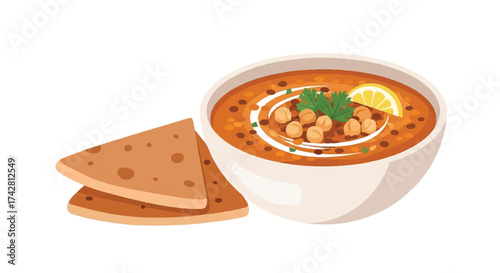 A delicious bowl of chana masala, a traditional Indian chickpea curry, served with flatbread and a lemon wedge, perfect for a hearty meal