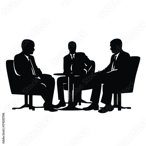 Three dark silhouettes of businessmen converse at a small round table using professional posture