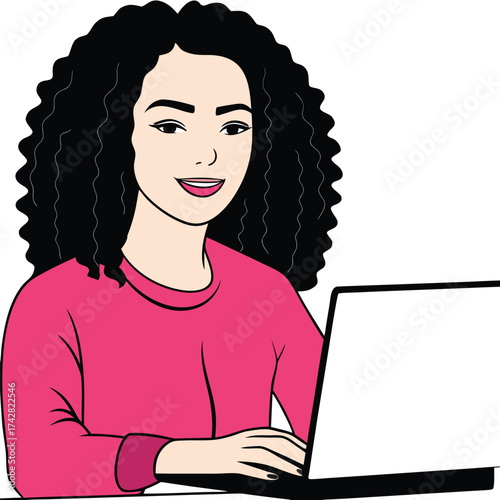 Smiling African American woman in pink sweater works on a laptop computer