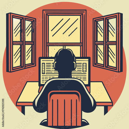 Person with headphones is seated near the window viewing a computer monitor display