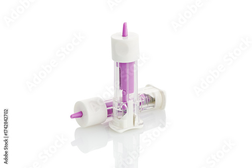 Medical scarifier isolated on white background. Automatic lancet scarifier for painless blood sampling. Blood test.
