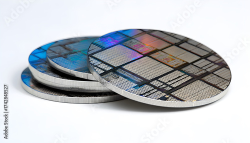 Polycrystalline silicon wafer with microchips isolated on white. Microelectronic device for the fabrication of integrated circuits
