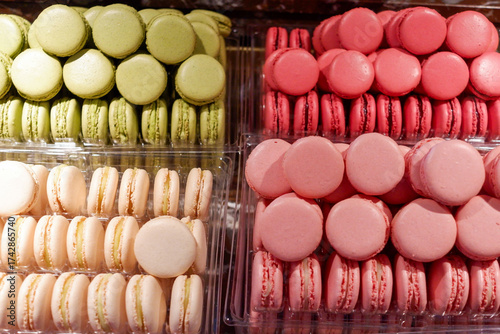 Quadro su tela Colorful macarons Laduree displayed in elegant patisserie showcase, featuring vi