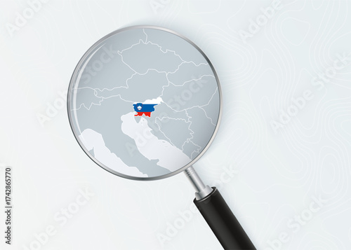 Slovenia Map Under Magnifying Glass with National Flag Overlay.