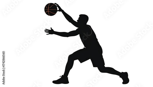 Silhouette of a basketball player reaching for a bouncing ball