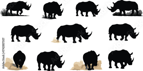 Rhino silhouette collection vector set, powerful wild animal illustration with dust effect, African wildlife design, endangered species artwork concept