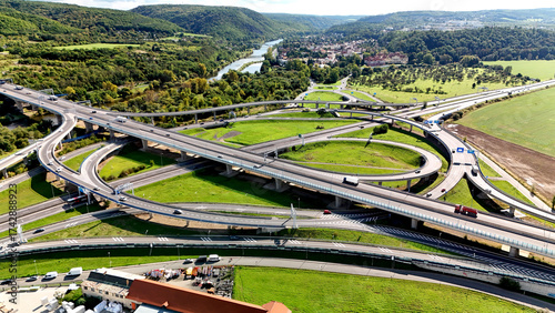 Obraz na plátne Aerial photo of a large highway interchange with curved overpasses and multiple lanes