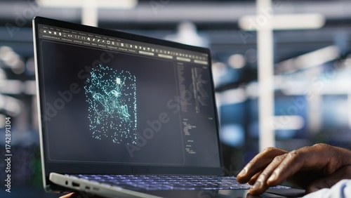 Tablou pe pânză Close up of data center admin using machine learning algorithms on laptop to analyze large datasets
