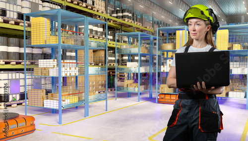 Female warehouse worker in ...