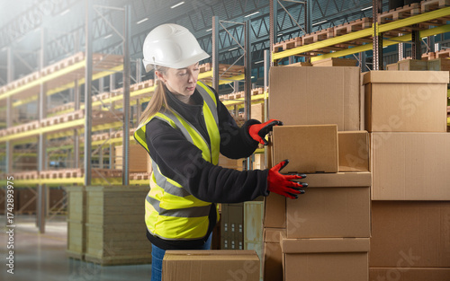 Female warehouse worker in ...