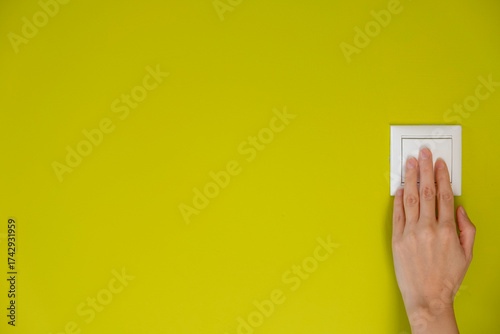 Switching off the light. Saving concept. Copy space.